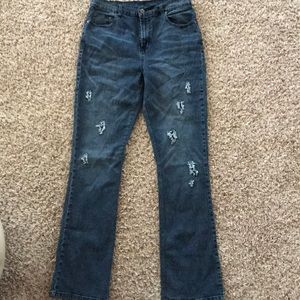 Distressed Super Stretch Bootcut Jean